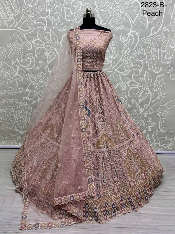 Soft Premium net  Wedding Wear Lehenga In Peach Color With Embroidery Work