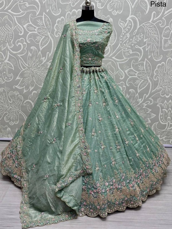 Pure Silk Crush Fabric Wedding Wear Lehenga In Pista Color With Embroidery Work