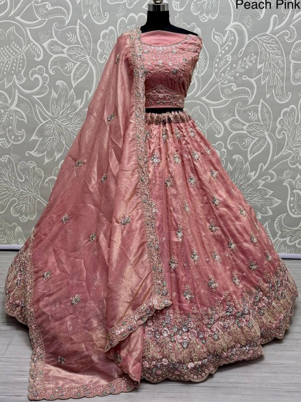 Pure Silk Crush Fabric Wedding Wear Lehenga In Peach Color With Embroidery Work