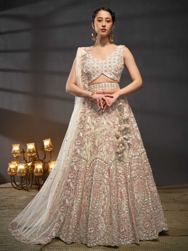 Soft Premium Net Party Wear Wear Lehenga In Cream Color With Embroidery Work 