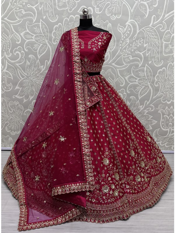 Pure Silk Fabric Wedding Wear Lehenga In Rani Pink Color With Embroidery Work