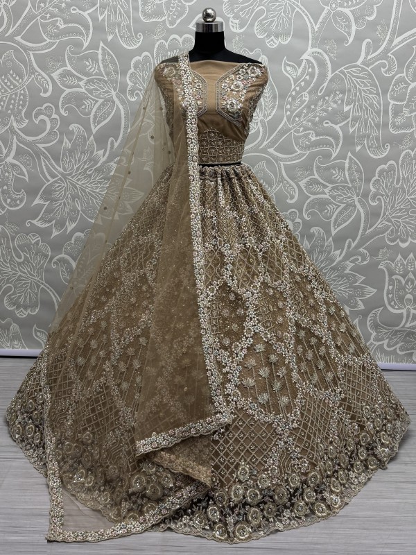 Soft Premium Net Fabric Wedding Wear Lehenga In Golden Color With Embroidery Work