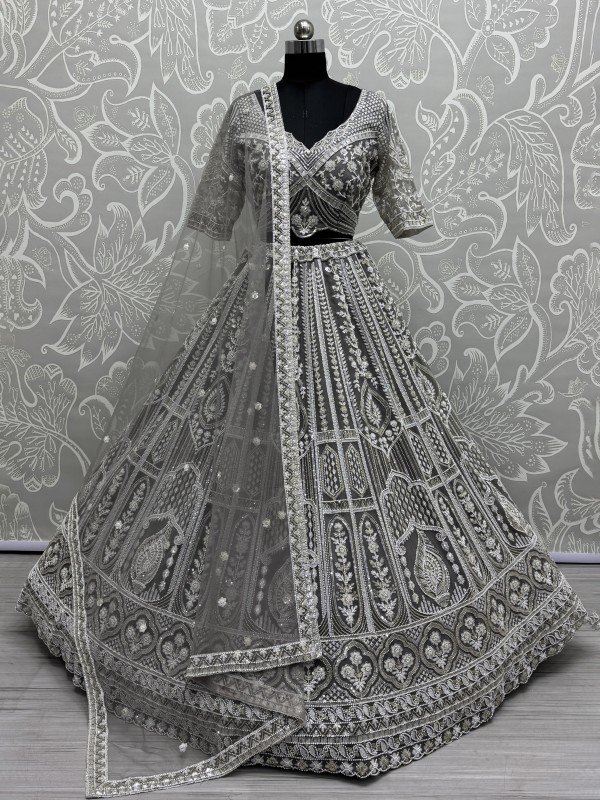 Soft Premium Net Fabric Wedding Wear Lehenga In Stone Grey Color With Embroidery Work