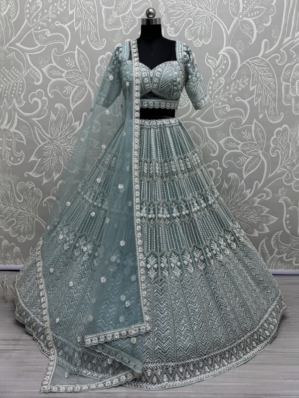 Soft Premium Net Fabric Wedding Wear Lehenga In Turquoise Color With Embroidery Work