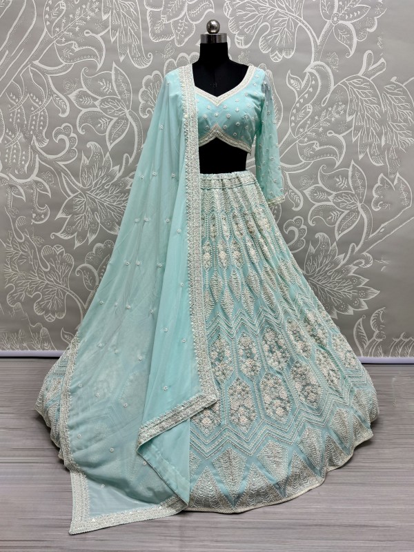 Soft Premium Net Fabric Wedding Wear Lehenga In Turquoise Color With Embroidery Work