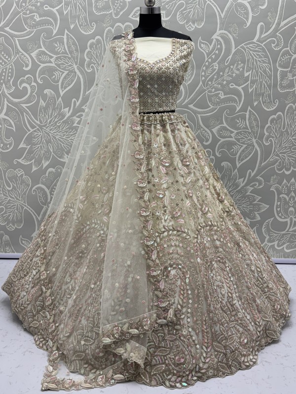 Soft Premium Net Wedding Wear Lehenga In Off White Color With Embroidery Work