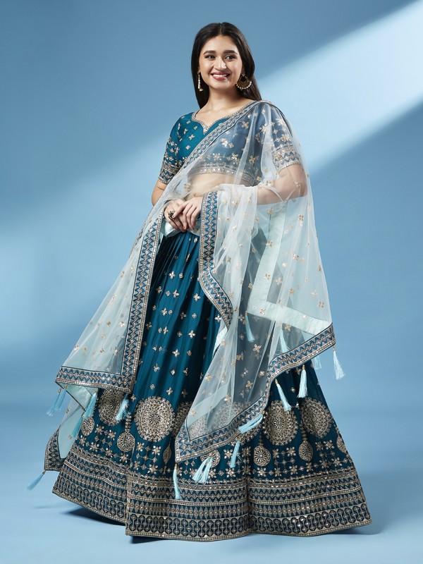 Pure Geogratte Party Wear Wear Lehenga In Teal Color With Embroidery Work 