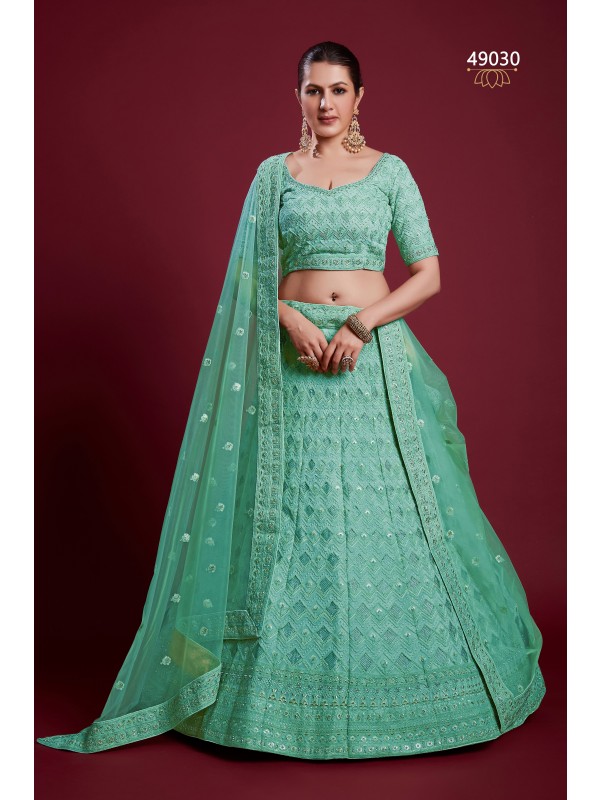 Geogratte Fabrics Party Wear Lehenga in Turquoise Color With Embroidery Work