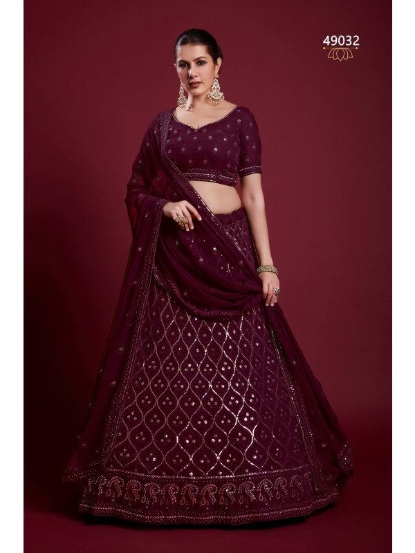 Geogratte Fabrics Party Wear Lehenga in Wine Color With Embroidery Work