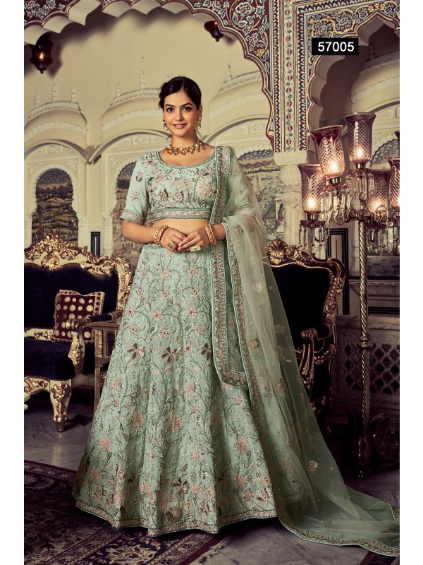 Geogratte Fabrics  Wedding Wear Lehenga in Turquoise Color With Embroidery Work