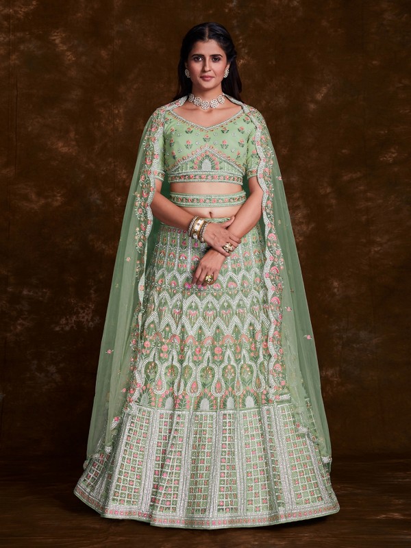 Soft Premium Net Wedding Wear Lehenga In Green Color  With Embroidery Work