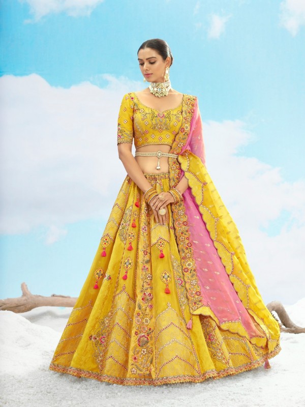 Fancy Silk Wedding Wear Lehenga in Yellow Color With Embroidery work