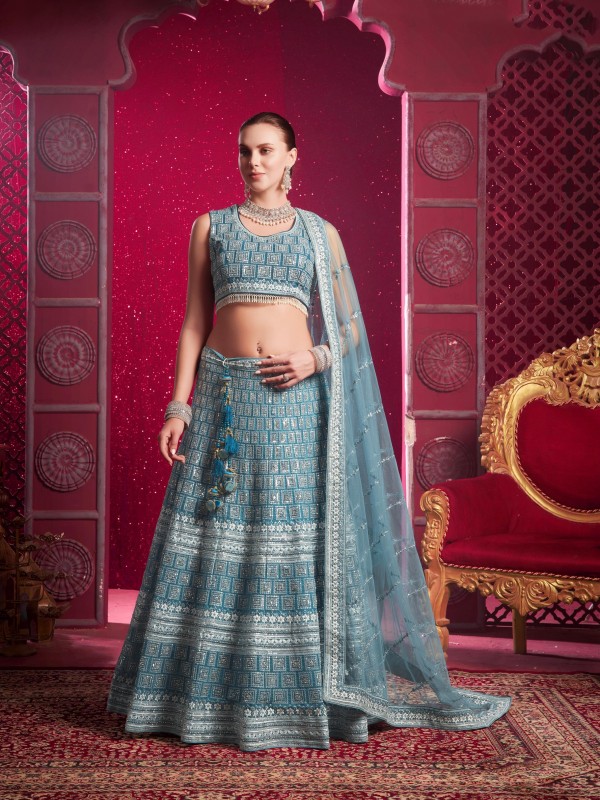 Soft Premium Net Fabric Wedding Wear Lehenga In Blue Color With Embroidery Work