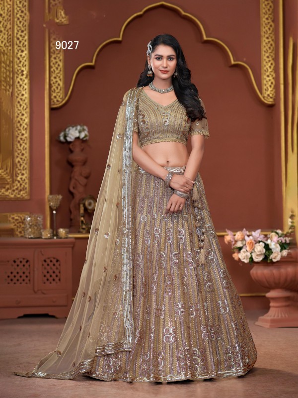 Soft Premium Net Fabric Wedding Wear Lehenga In Golden Color With Embroidery Work
