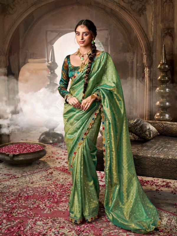 Pure Tissue Silk Party wear Saree In Green Color with Embroidery Work 
