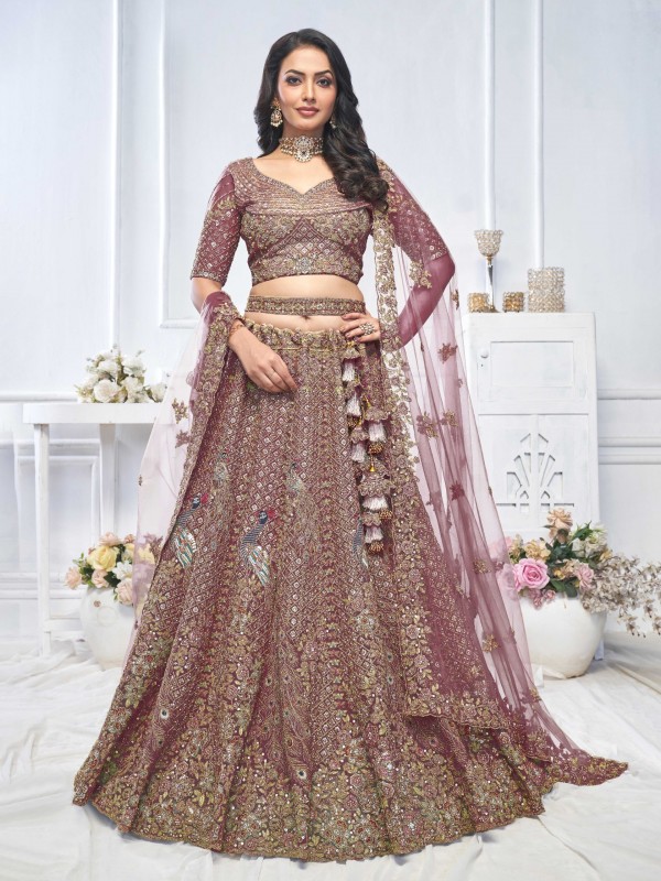 Soft Premium Net Wedding Wear Lehenga In Onion Color With Embroidery Work