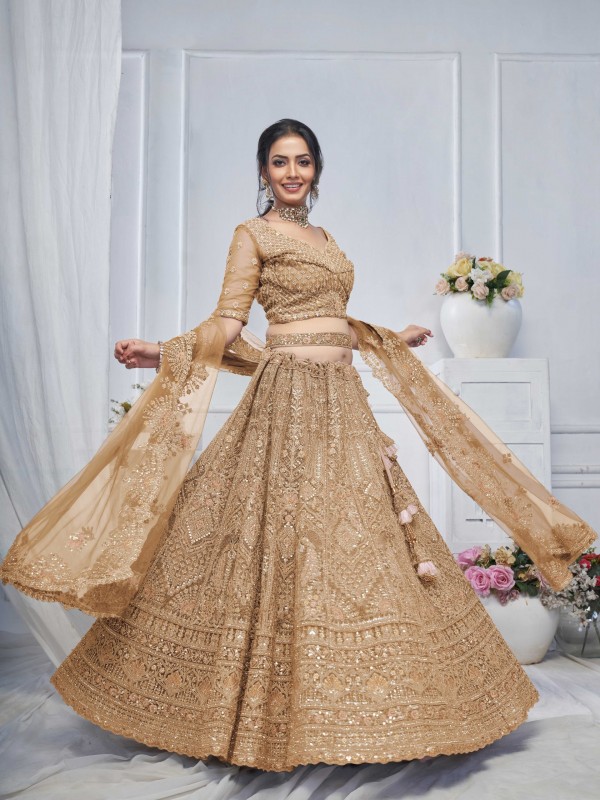 Soft Premium Net Wedding Wear Lehenga In Golden Color With Embroidery Work