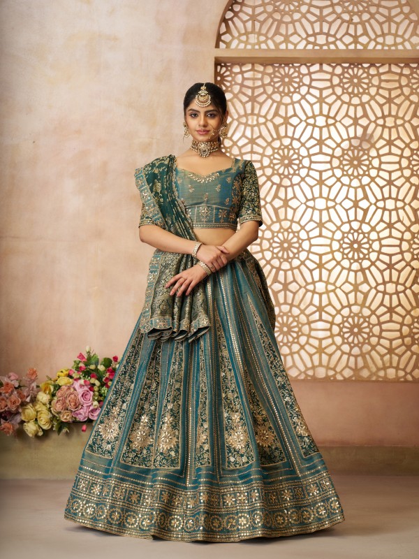 Bridal Net Silk Wedding Wear Lehenga In Green Color With Embroidery Work
