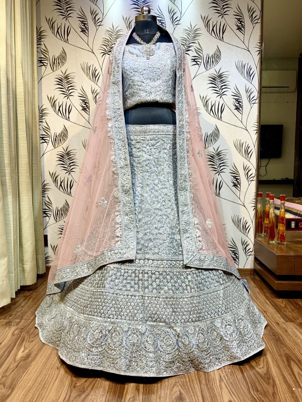 Soft Premium Net Wedding Wear Lehenga In Grey With Embroidery Work & Stone Work 